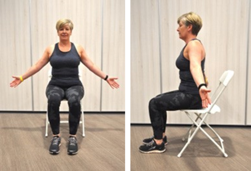 Person sitting on chair doing chest stretch exercise