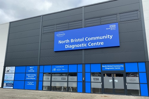 A building with a blue sign reading "North Bristol Community Diagnostic Centre"