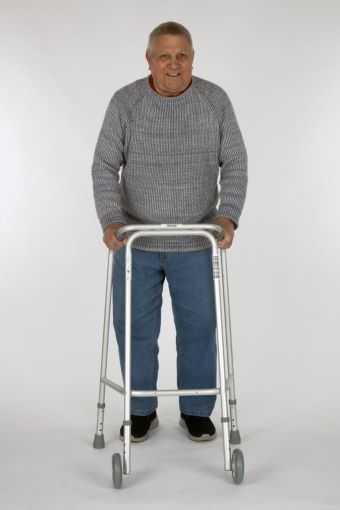 Man with walking aid/zimmer frame