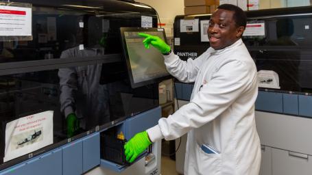 Happy Lab Technician with equipment