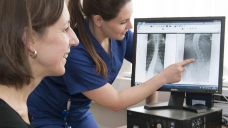 Patient & Doctor viewing an x-ray