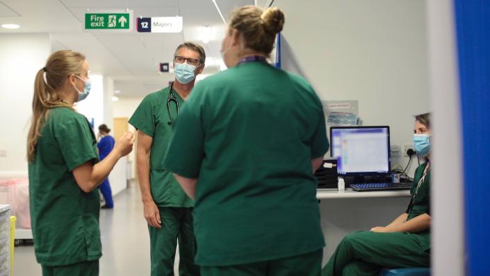 Emergency Department Doctors talking in a corridor