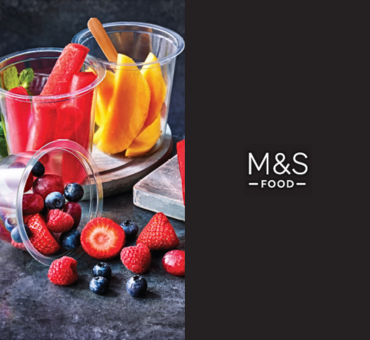 Photograph of different fruit in plastic pots alongside M&S logo