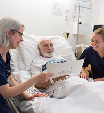 Picture of two nurses with patients 