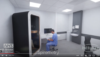 A digital image of a person in blue scrubs sitting outside a large,  upright, rectangular box, and the word "spirometry" on the screen belowr